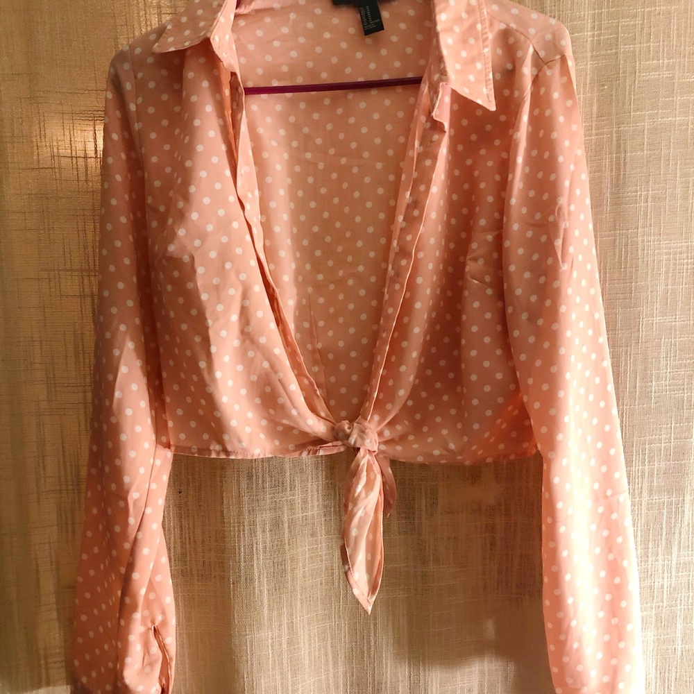 Pink and white polka dot blouse